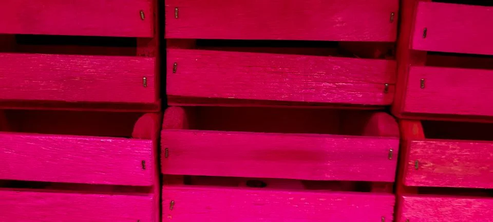 Pink colored wooden crate stacked,rustic wood Stock Photos