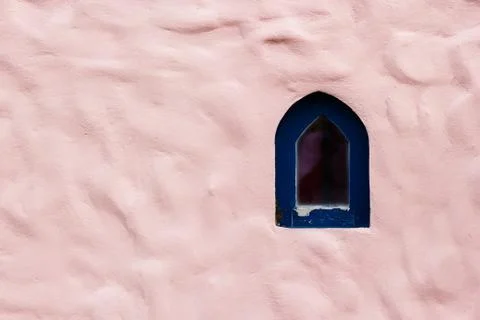 Pink concrete wall pattern Wave shape with small window. Abstract pink cement Stock Photos
