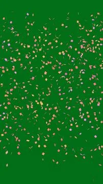 Pink Confetti Explosion on Green Screen Stock Photos