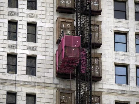 Pink Construction Hoist Elevator on Historic Building Facade Cincinnati Stock Photos