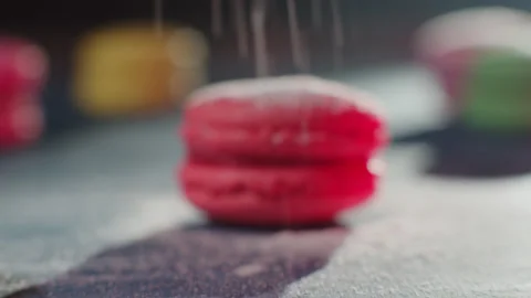 Pink cookie in powdered sugar. Stock Footage 149127362