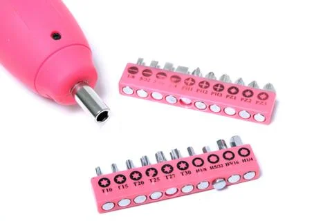 Pink  cordless screwdriver and bits Stock Photos