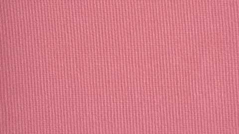 Pink cosmetics background. Pink blusher texture, macro, top view. Decorativ.. Stock Footage 254070928