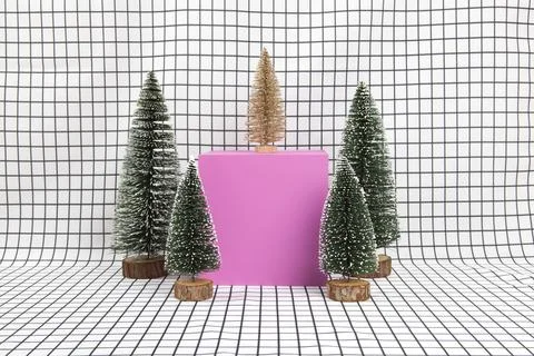 Pink cube miniature forest and grid background Stock Photos