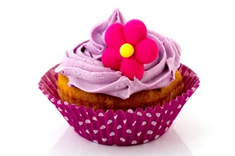 Pink cupcake with flower Stock Photos