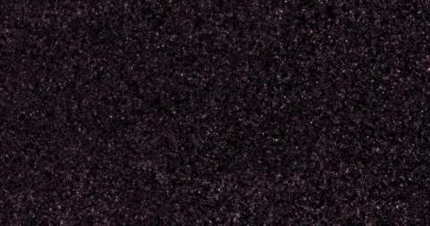 Pink dancing glitter particles on black background for overlay. Stock Footage 264049495