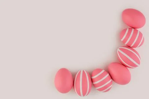 Pink decorated Easter eggs in the bottom corner of light background. Stock Photos