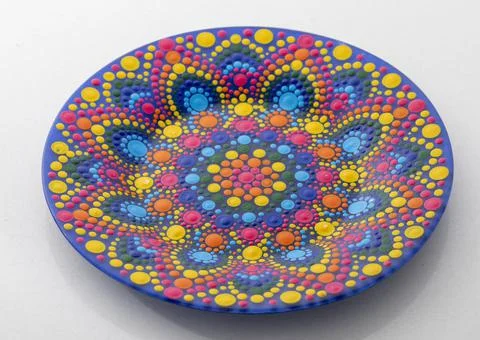 Pink decorative plate with a pattern in the style of a mandala Foto stock