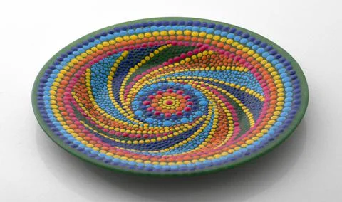 Pink decorative plate with a pattern in the style of a mandala Fotos Stock