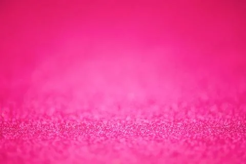 Pink defocused glitter background with thin focus part and defocused main par 写真素材