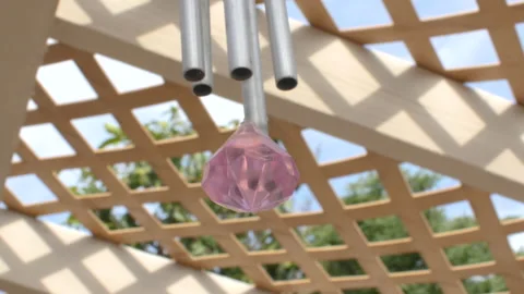 Pink Diamond Wind chime blowing in wind. Stock Footage 133156316