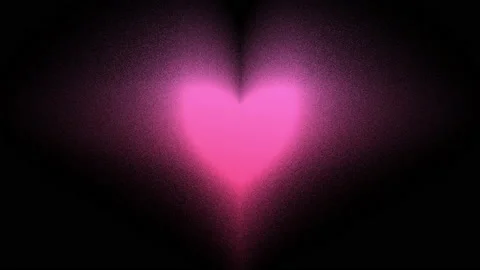Pink dissolving heart animation, isolated on a black background Stock Footage 142078597