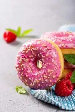 Pink donuts on gray background Foto stock