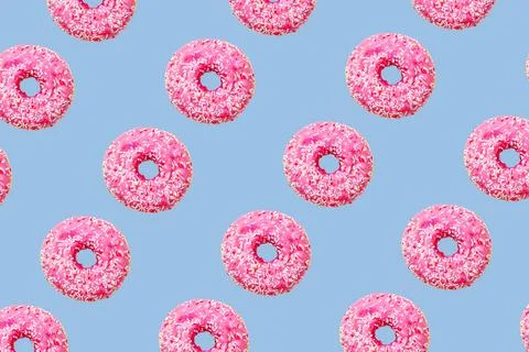 Pink donuts on light blue background big size Stock Photos