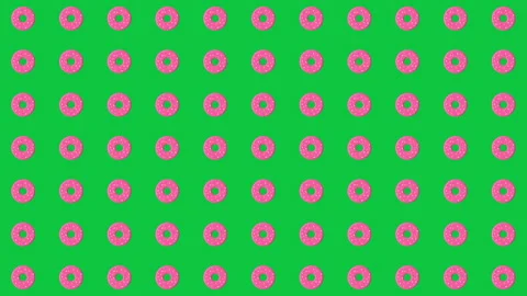 Pink donuts pattern on green background Stock Footage 308249676