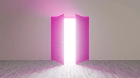 Pink door opening to bright light in empty room Stock Footage 310791687
