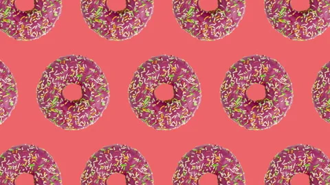 Pink doughnuts seamless pattern on a coral background Stock Footage 144206676