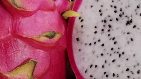 Pink dragon fruit. Exotic Pitaya or pitahaya is a fruit of several different Stock Footage 275844678