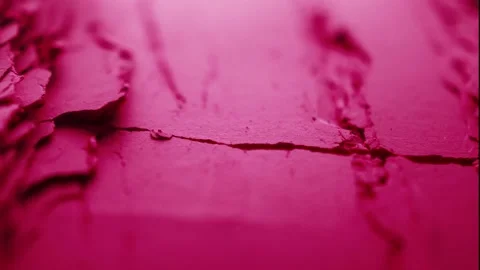 Pink dry paint cracks Stockbeeldmateriaal 163523300