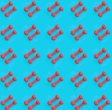 Pink dumbbell pattern on a blue background Stock Photos