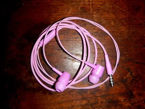 Pink earbuds Stock Photos
