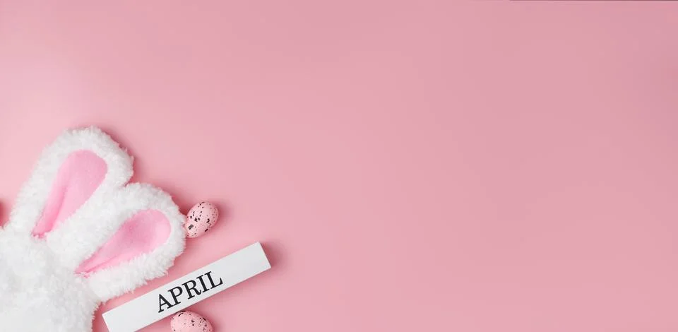 Pink easter banner with eggs and bunny ears.Copyspace banner Stock Photos