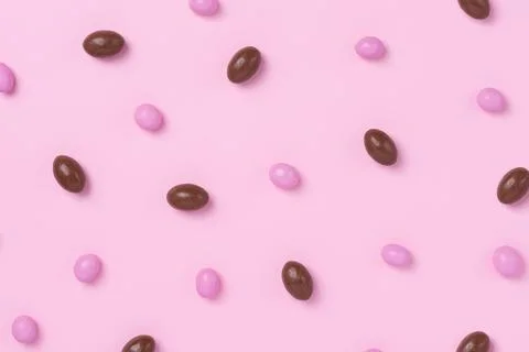 Pink easter dragee on a pink background Stock Photos