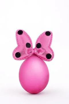 Pink Easter egg with bow isolated on white background Stock Photos