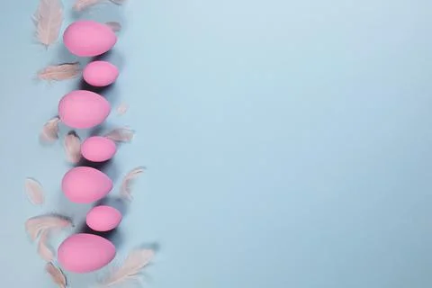 Pink Easter eggs on a blue background Stock Photos
