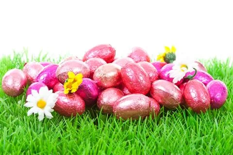 Pink easter eggs on grass Stock Photos
