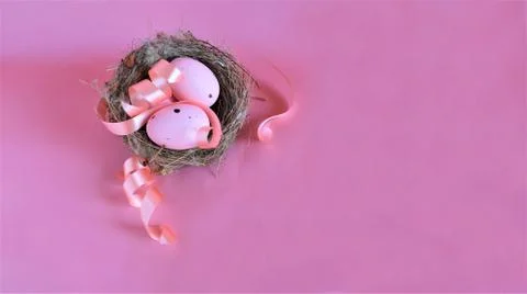 Pink easter eggs on pink background Stock Photos