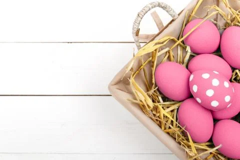 Pink Easter eggs on wodden background. Still life photo of lots of pink easte Stock Photos