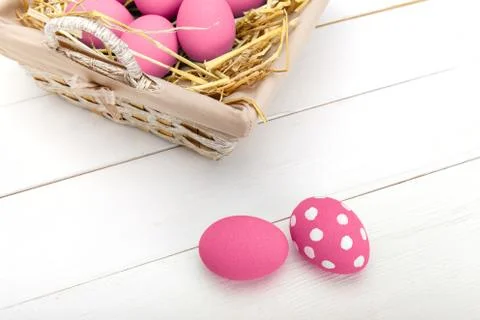 Pink Easter eggs on wodden background. Still life photo of lots of pink easte Stock Photos
