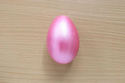 Pink of easter eggs on wood background. Stock Photos