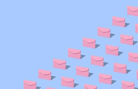Pink envelope on a blue background. Stock Photos