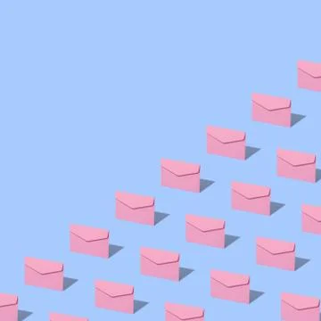 Pink envelope on a blue background. Stock Photos
