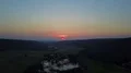 Pink evening sunset aerial woodland and lake valley landscape before spring 4k 4k or 4k+ Resolution