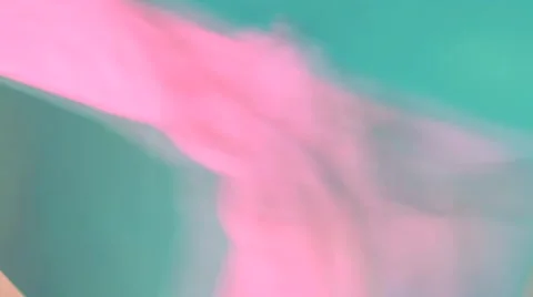 Pink fabric flows slowly Stock Footage 64574939