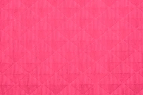 Pink fabric with geometric patterns, a background or texture Stock Photos