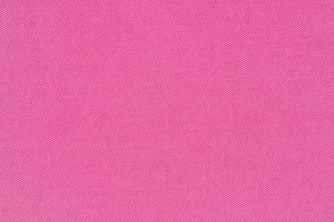Pink fabric texture with diagonal weave pattern. Macro view of cotton texti.. Stock Photos