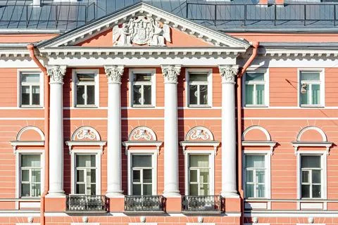 Pink facade of the building. Stock Photos