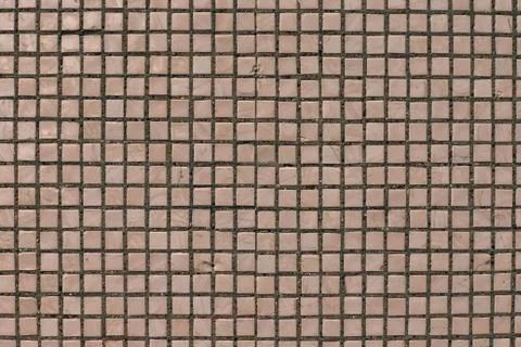 Pink facing mosaic on old soviet house background texture Stock Photos
