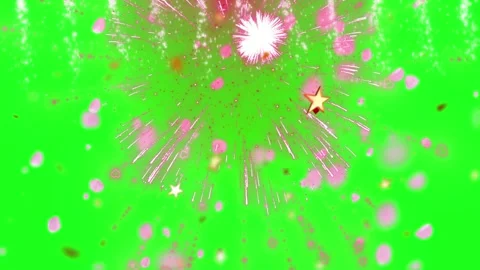 Pink fireworks explode and glittering confetti falls against a green screen Stock Footage 339257457