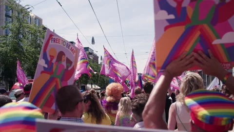 Pink Flags  in Protest Walk Rainbow Lhbti+ Gay Pride Netherlands Amsterdam Stock Footage 234409481