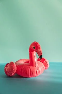 Pink flamingo inflatable pool floaty for summer fun Stock Photos