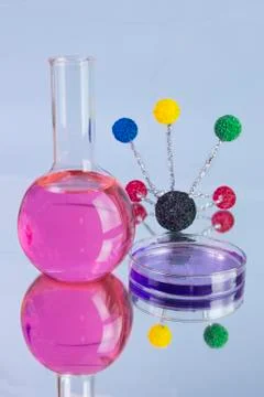 Pink flask with molecular model Stock Photos
