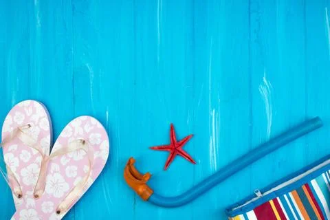 Pink flip flops, corals, slave, sunscreen, starfish ,summer background. Top.. Stock Photos