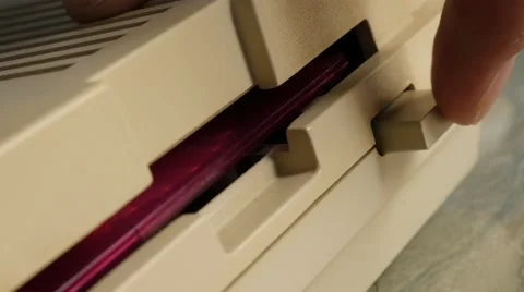 Pink floppy disk ejcecting from personal computer 4K 3840X2160 UltraHD footag Stock Footage 52453015