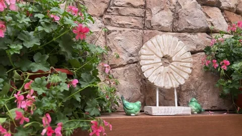 Pink Floral Decor on Rustic Stone Fireplace Mantel in Luxury Gazebo Vídeo Stock 334885016