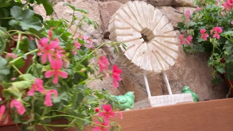 Pink Floral Decor on Rustic Stone Fireplace Mantel in Luxury Gazebo Stock Footage 334885200